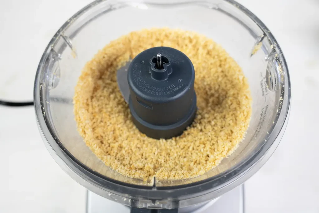 Ritz crackers blitzed into fine crumbs in a food processor.