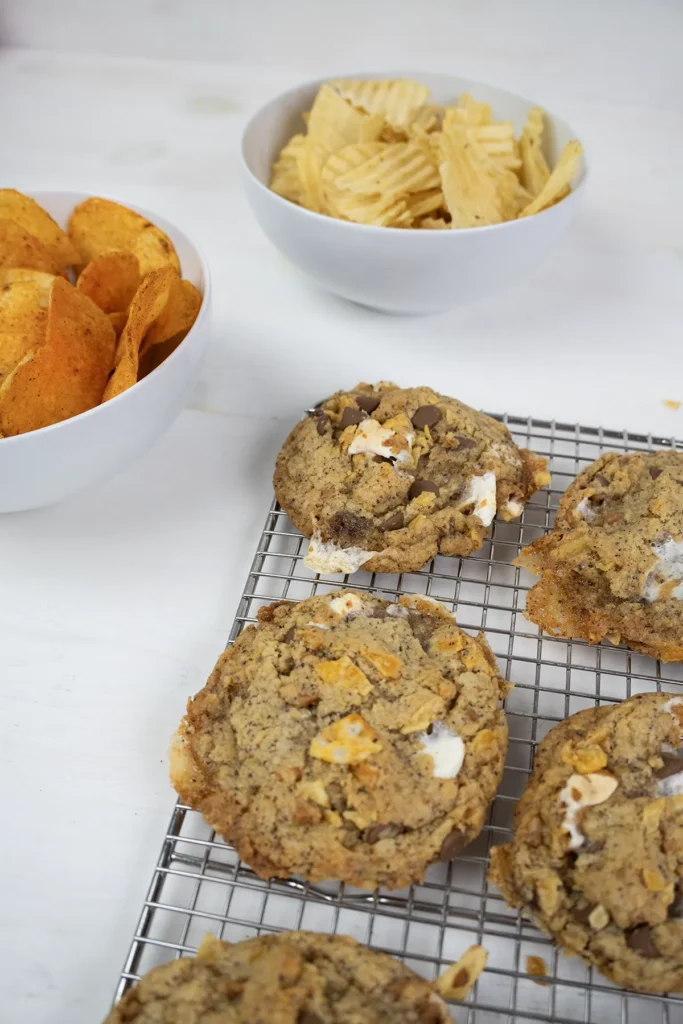 Kitchen sink cookies on a wire cooling rack.
