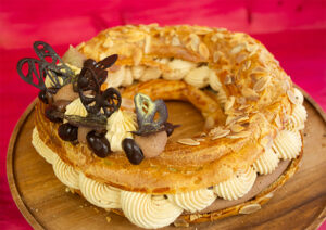 Paris-Brest pastry filled with lots of creamy fillings and topped with chocolate butterflies.