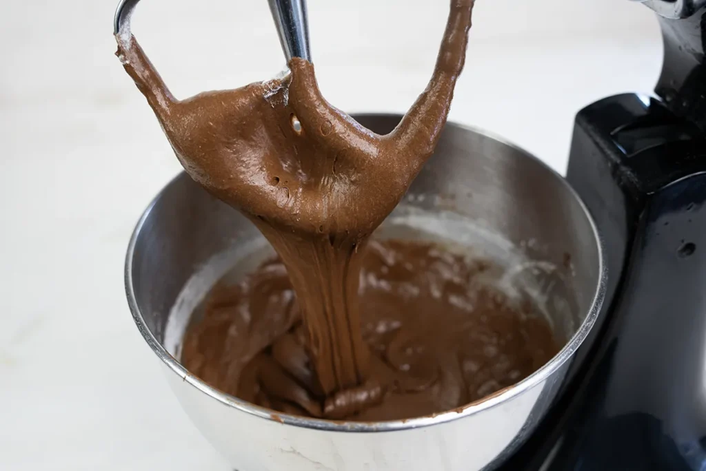 Batter for chocolate orange brownie cookies after adding the dry ingredients.