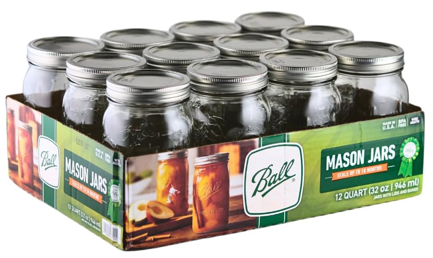 A box of wide-mouth canning jars.