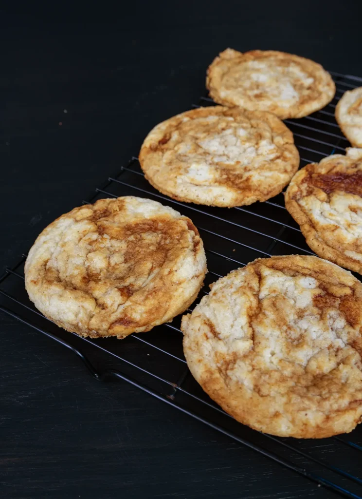Sourdough gochujang caramel cookies cooling on a wire rack.