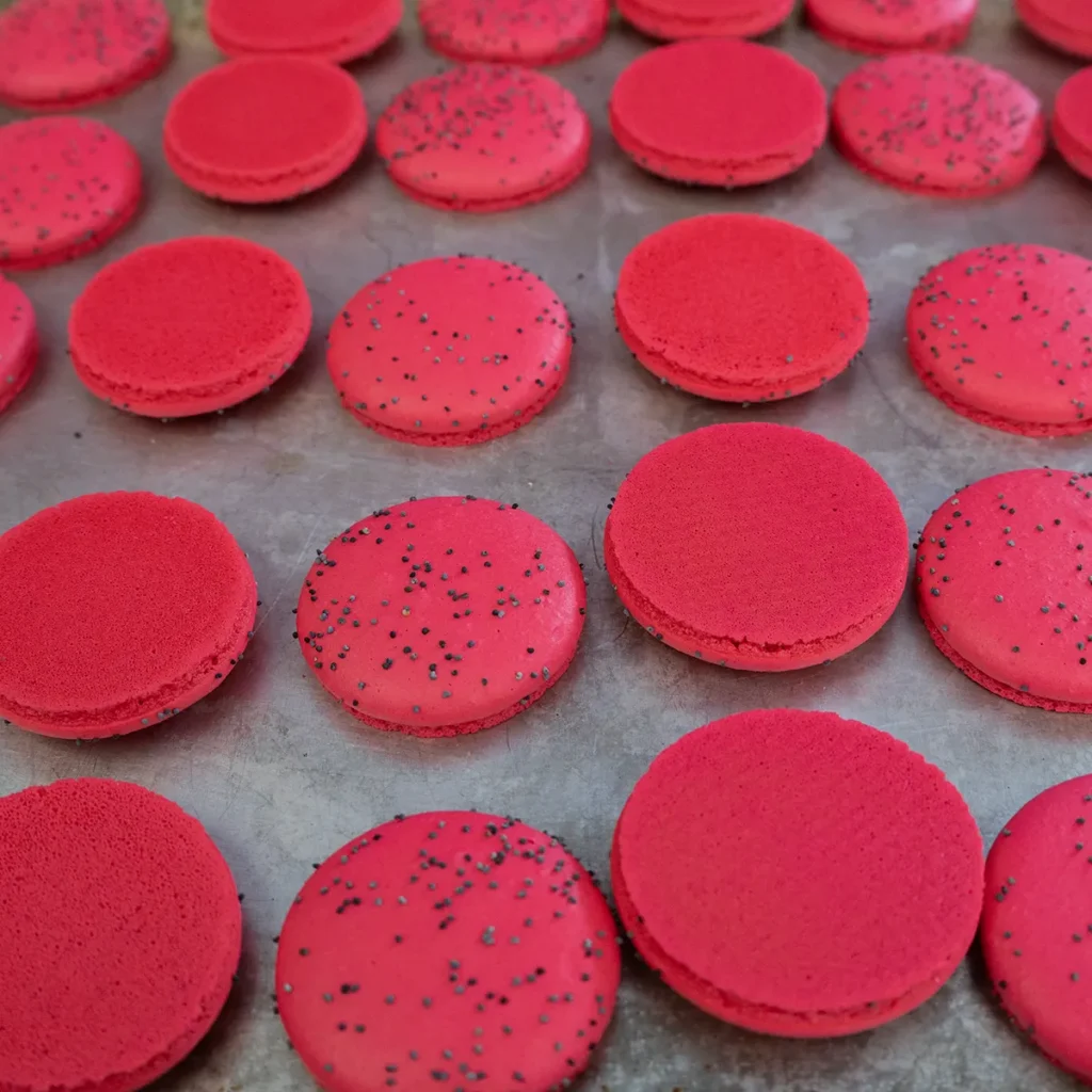 Lining up pairs of macarons of matching sizes.
