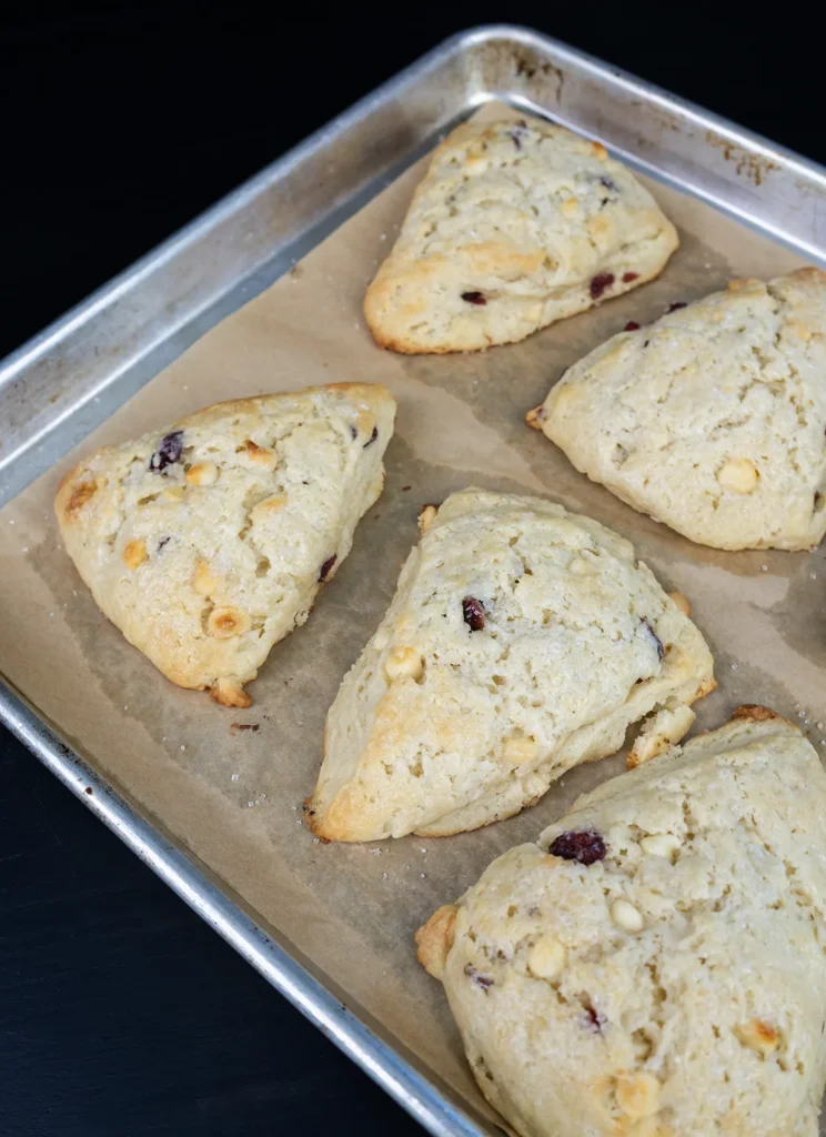 Baked scones on a baking sheet.