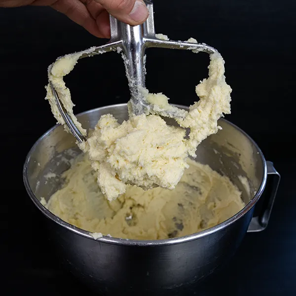 Mixed sugar cookie dough for sourdough gochujang caramel cookies.