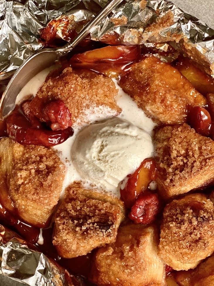 Peach cobbler in a tinfoil packet.