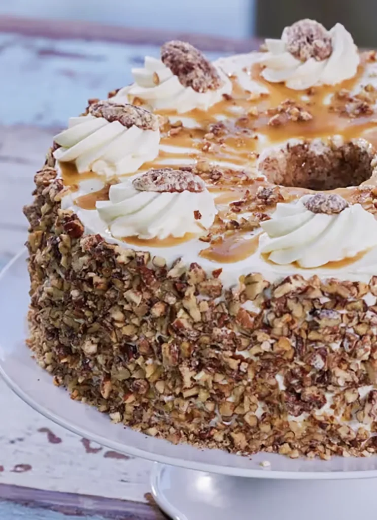 Schmoo torte on a cake stand.