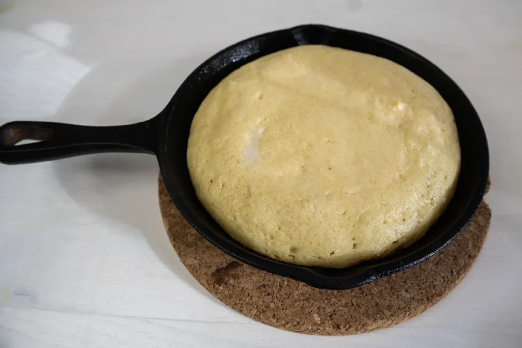 Skillet pancake with top set, before flipping.