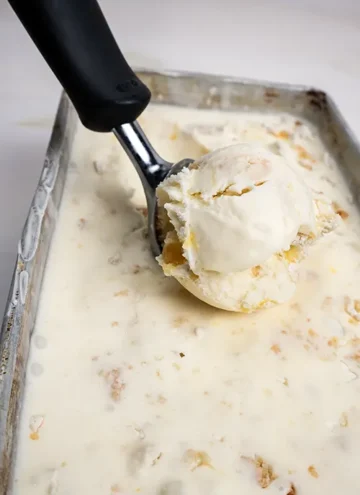 Making a scoop of lemon meringue pie ice cream.