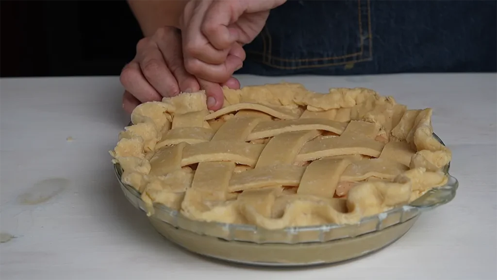 Crimping the edges of a double-crust pie.
