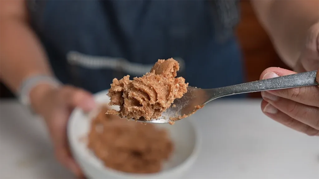 Close up of cinnamon sugar butter paste filling for cinnamon rolls.