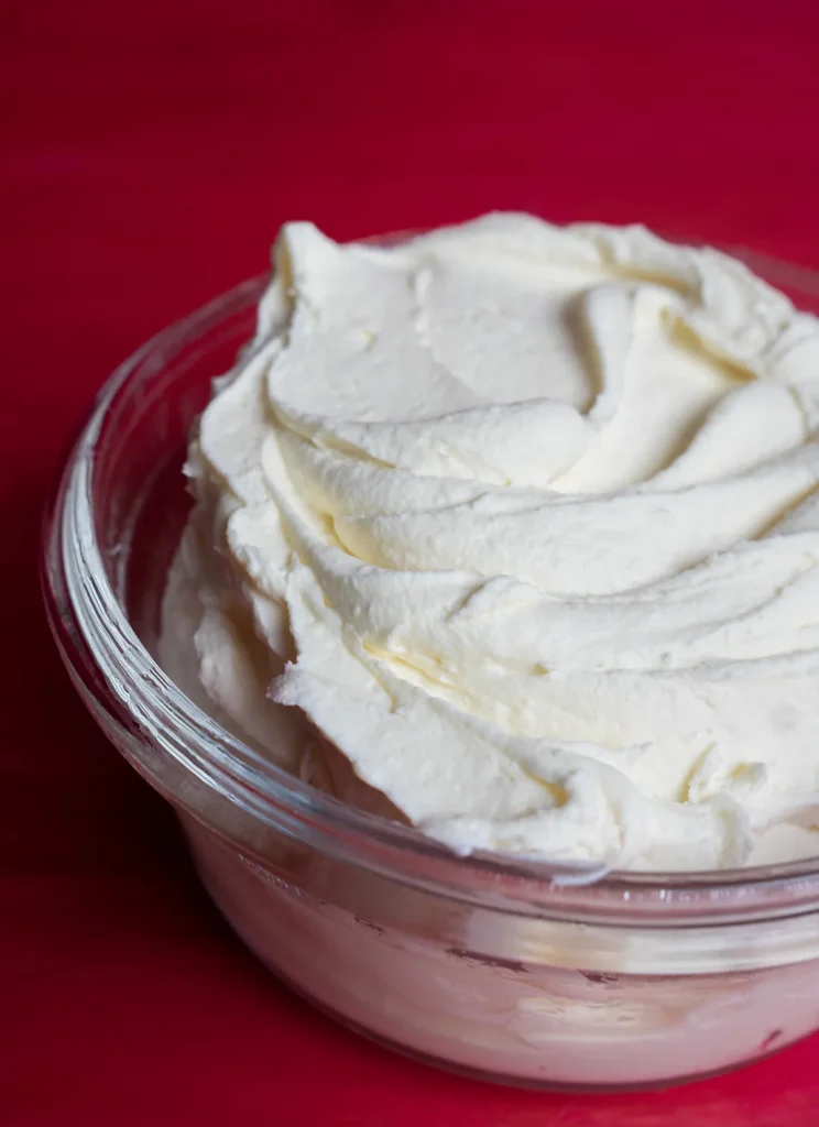 Container of homemade mascarpone cheese.