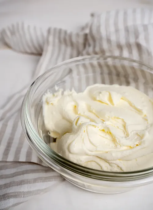 Container of homemade mascarpone cheese.