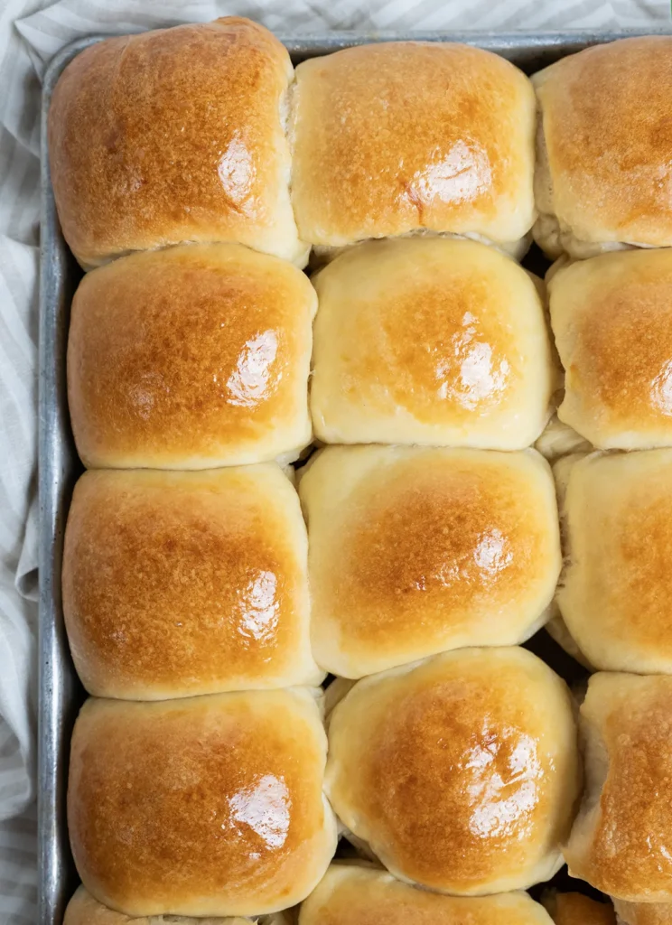 A tray of sourdough Hawaiian rolls.