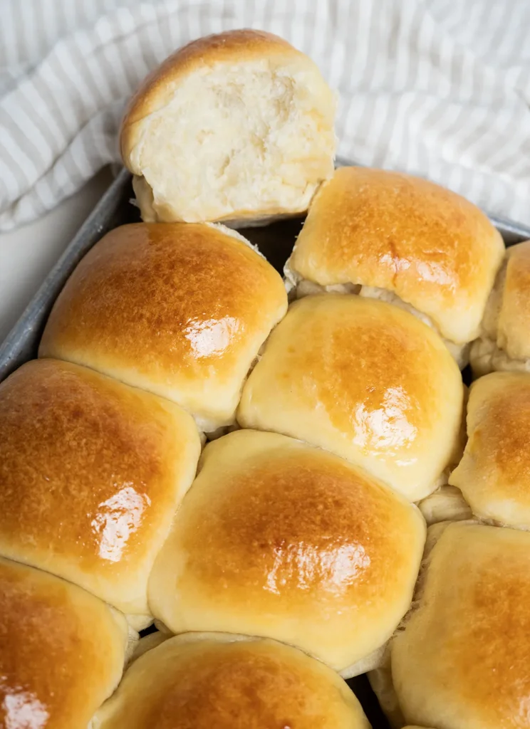 A tray of sourdough Hawaiian rolls.
