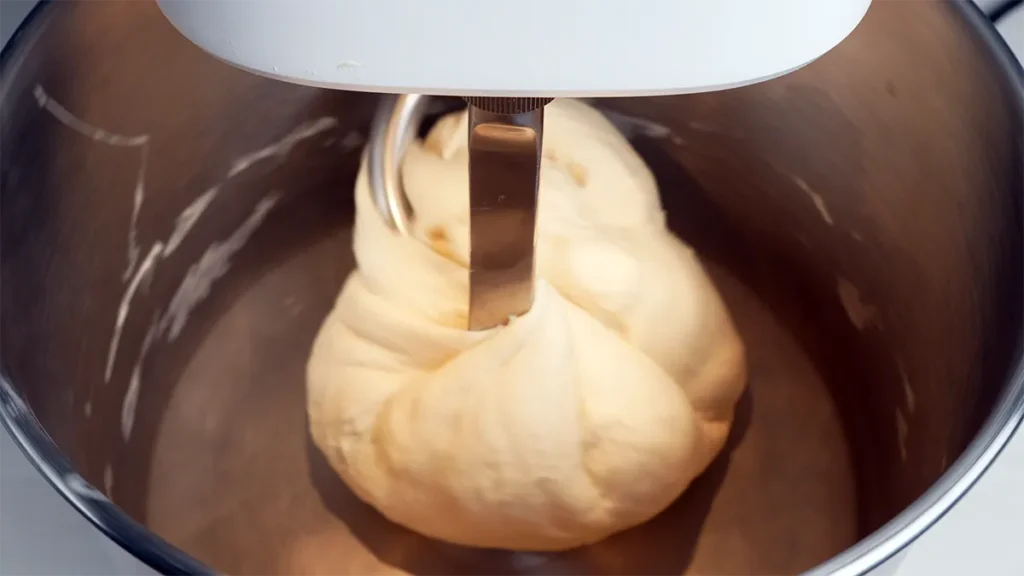 Kneading a batch of sourdough Hawaiian rolls in the Ooni Halo Pro.