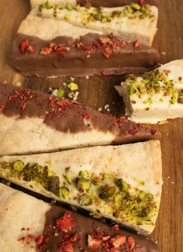 Tray of classic Scottish shortbread wedges dipped in chocolate.
