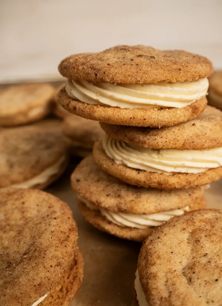 A stack of eggnog snickerdoodle sandwich cookies.